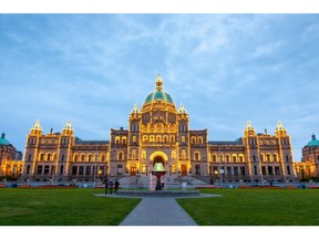Night view of the legislature building in Victoria. A few quick and straightforward changes to the Lobbyists Registration Act would do much to improve its standing.