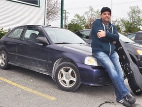 Musician Ranj Singh with his "Purple Haze" car in June of 2015.