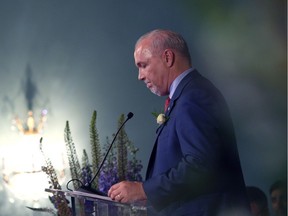 Premier John Horgan gives a speech after being sworn-in during a ceremony with his provincial cabinet at Government House in Victoria, B.C., on Tuesday, July 18, 2017.