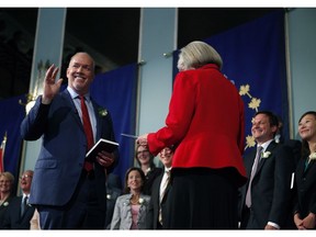 New B.C. Premier John Horgan, left, says he has full confidence in Don Wright: 'Don is responsible for putting together the deputy team and I have tremendous confidence in Don —as does the public service.'