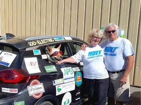 Piper the dog, left, is travelling across the country with Barb Hetherington and Buddy Boyd in a Chevrolet Bolt.