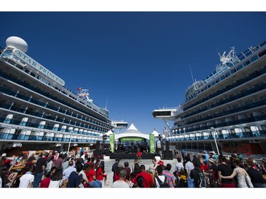 Cruise ships flank the Vancouver Sun stage at the Canada Day celebrations at Canada Place, Vancouver, July 01 2017.
