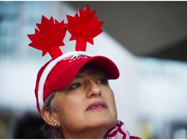 Pily Hobson reflects on her journey to become a Canadian citizen at the Canada Day celebrations at Canada Place, Vancouver, July 01 2017.