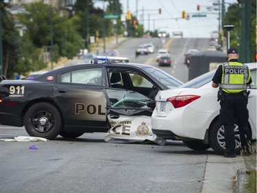 Vancouver Police investigate a car crash at 41st Avenue and Knight Street that involved a VPD cruiser.