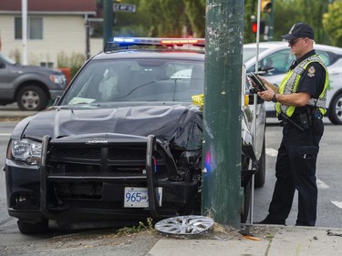 Vancouver Police investigate a crash Wednesday afternoon at 41st Avenue and Knight Street that involved a VPD cruiser.