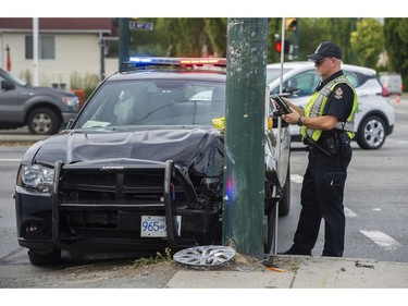 Vancouver Police investigate a crash Wednesday afternoon at 41st Avenue and Knight Street that involved a VPD cruiser.