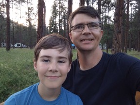 Web programmer Eric Shelkie, with his 13-year-old son Evan, camping at the Kettle Creek campground near Osoyoos. Shelkie, a partner in the design firm SmashLAB, developed a web-based program capable of finding campsites that become available due to cancellation on B.C. Parks' Discover Camping website. They call it Campnab.