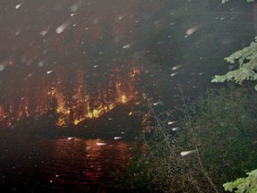 A photo of the wildfire burning around Loon Lake on July 18.