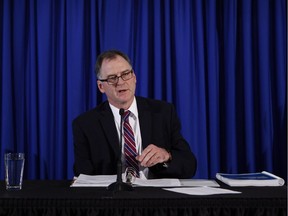 Ombudsperson Jay Chalke releases his report into the terminations of Ministry of Health employees in 2012 during a press conference in Victoria, B.C., on Thursday, April 6, 2017.