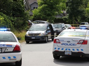 An woman is recovering from a wound sustained while sitting in a minivan with her family in Surrey on Sunday.