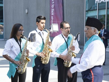 The Ismaili marching band practices outside BC Place in advance of the celebration. Ismaili youth are encouraged to partake in many forms of artistic expression from a young age.