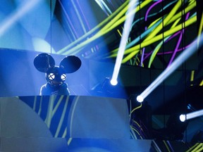 Deadmau5, Colleen D'Agostino

Deadmau5 performs with Colleen D'Agostino (not shown) during the 2015 Juno Awards in Hamilton, Ont., on Sunday, March 15, 2015. THE CANADIAN PRESS/Nathan Denette
Nathan Denette,