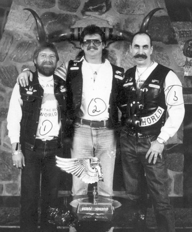 901005-HAMEL-BOUCHER-GILES "Normand (Biff) Hamel (left) with fellow Hells Angels Maurice (Mom) Boucher and David (Gyrator) Giles in a photo taken in 1990" -  (SOURCE:"evidence filed in court" ) (CITY-Farrell Request)
Normand (Biff) Hamel (left) was a close friend of Hells Angels leader Maurice (Mom) Boucher (centre) during the 1990s. At right is another biker, David Giles. Hamel was killed in 2000 during the biker drug wars. This photo was submitted as evidence during a criminal trial.

This one, SVP