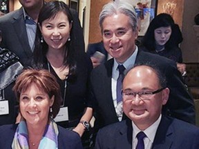 Paul and Loretta Oei stand behind then premier Christy Clark and MLA John Yap at a 2015 B.C. Liberal fundraiser.