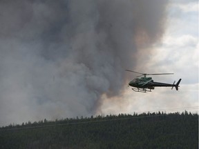 A British Columbia official says getting people to safety as fast-moving wildfires approached was only half the battle -- the other half will be returning them home.