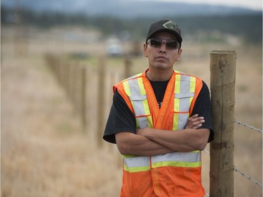 Tsilhqot'n Nation member Tyrone Hance, who runs a skidder helping to build fire guards on band land near Williams Lake, BC Thursday, July 13, 2017. Hundreds of residents of the nation have chosen not to evacuate their homes and are fighting the raging wildfires that have spread across their territory with help from ministry firefighters.