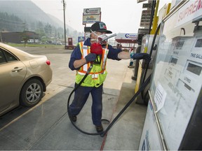 Many businesses in Williams Lake are closed or operating with reduced hours as the threat from wildfires have left many businesses without staff. Miles St. Amand of Sun Valley Gas has been working 12-hour shifts to meet motorists' demands.