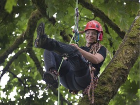 Certified arborist Kali Alcorn ascends a tree with ropes. Alcorn will be competing in the International Tree Climbing Championships in Washington, D.C. on July 28-30.