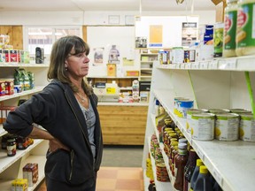 Lisa McInnes stares at a near-empty shelf while working at Clarke’s General Store in Horsefly. ‘It’s getting pretty thin,’ she says.