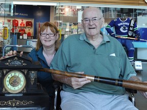 Joanne Johnson and her father Harvey recently donated an 1888 baseball bat and an 1892 clock that belonged to their relative, F.A. Jackson, to the BC Sports Hall of Fame.