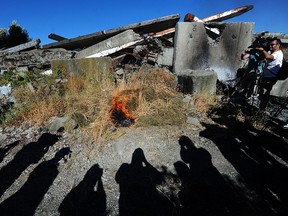 Vancouver Fire and Rescue Services holds a demonstration to show how quickly a fire can start and spread, particularly from discarded cigarettes.