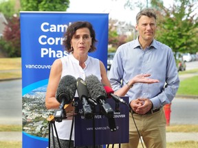 Susan Haid, assistant director of planning for Vancouver South, joins Mayor Gregor Robertson Sunday in outlining the city's new affordable rental housing initiatives for the Cambie corridor.