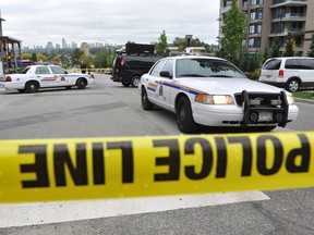 Police investigate the fatal shooting of Aladdin Ramadan at Lougheed Highway and Rosser in Burnaby  on Sept. 25, 2014. A youth who was 16 at the time has been convicted of manslaughter.