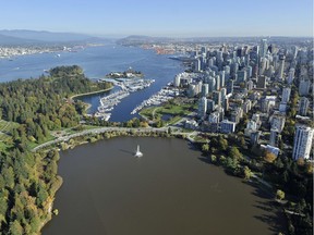 An aerial view of Lost Lagoon and, across the Stanley Park causeway, Burrard Inlet, taken in 2010. Until a century ago, it was all one body of water.