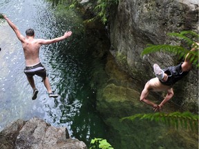 NORTH VANCOUVER, BC -- July  4,  2013 --    The Thirty Foot Pool provides  thrill seekers a place to dive in Lynn Canyon in North Vancouver on July 4, 2013.