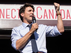 Prime Minister Justin Trudeau speaks on the CP Canada 150 train during a event stop in Revelstoke on Saturday July 29, 2017.