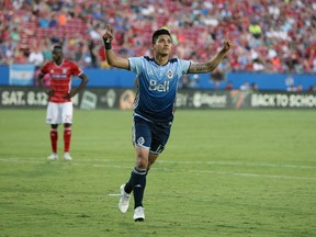 Vancouver Whitecaps forward Fredy Montero (12) celebrates his goal on a penalty kick in the second half against FC Dallas at Toyota Stadium.