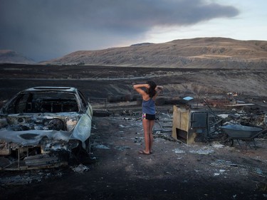 Nevaeh Porter

Nevaeh Porter, 8, reacts while viewing the remains of her home where she lived with her mom and grandparents that was destroyed by wildfire on the Ashcroft First Nation, near Ashcroft, B.C., late Sunday July 9, 2017. THE CANADIAN PRESS/Darryl Dyck ORG XMIT: VCRD218
DARRYL DYCK,