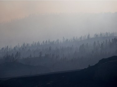 Smoke

Smoke from wildfires fills the air on the side of a mountain in Boston Flats, B.C., on Sunday July 9, 2017. B.C. government officials now estimate that 7,000 people have been evacuated from their homes due to wildfires burning in the province. THE CANADIAN PRESS/Darryl Dyck ORG XMIT: VCRD241
DARRYL DYCK,