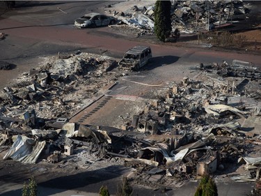 Rubble

The remains of mobile homes destroyed by wildfire are seen at a trailer park in Boston Flats, B.C., on Sunday July 9, 2017. B.C. government officials now estimate that 7,000 people have been evacuated from their homes due to wildfires burning in the province. THE CANADIAN PRESS/Darryl Dyck ORG XMIT: VCRD237
DARRYL DYCK,
