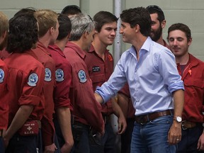 Prime Minister Justin Trudeau meets firefighters, members of the Canadian Forces and RCMP officers in Williams Lake, B.C., on Monday July 31, 2017.