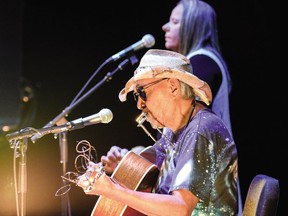 Willie Thrasher, front, and Linda Saddleback perform live.