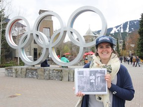 Whistler Walking Tour guide Jeanette Bruce holds a photo of Texan John Millar, one of the first settlers in the area who arrived exactly a century before the 2010 Winter Olympics.