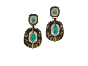 The David Webb Lantern earrings feature carved emeralds, brilliant-cut diamonds, black enamel, 18-karat gold and platinum. Price upon request.