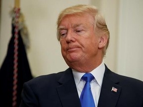 President Donald Trump listens in the Roosevelt Room of the White House in Washington, Wednesday, Aug. 2, 2017, during an event to unveil legislation that would place new limits on legal immigration. A leaked transcript of a Donald Trump phone call shows the president&#039;s private comments about trade with Canada, and suggests he had an overwhelmingly positive attitude about the northern neighbour as he took office. THE CANADIAN PRESS/AP/Evan Vucci