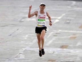 Tenth place finisher Eric Gillis, of Canada, approaches the finish line in the men&#039;s marathon at the 2016 Summer Olympics in Rio de Janeiro, Brazil, Sunday, Aug. 21, 2016. Running on empty, Canada&#039;s Eric Gillis only had 30 kilometres in him on Sunday.Three days after suffering a stomach virus that has struck several members of the Canadian team, the 37-year-old from Antigonish, N.S., dropped out around the 30-kilometre mark of the marathon at the world track and field championships.THE CANADIAN