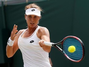 Varvara Lepchenko of the United States returns to Slovenia&#039;s Polona Hercog during their Women&#039;s Singles Match on day four at the Wimbledon Tennis Championships in London Thursday, July 6, 2017. Lepchenko downed top-seeded qualifier Magdalena Rybarikova of Slovakia 7-5, 6-0 on Sunday to advance to the main draw of the Rogers Cup. THE CANADIAN PRESS/AP/Kirsty Wigglesworth