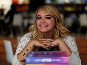 Author Anna Todd poses for a portrait at a bookstore in Mexico City, Wednesday, May 6, 2015. Wattpad is venturing well outside the digital realm as the Canadian-born online storytelling service propels its galaxy of creative stars further into the multiplatform universe. THE CANADIAN PRESS/AP, Dario Lopez-Mills