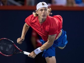 Denis Shapovalov of Canada serves to Alexander Zverev of Germany during the semifinals at the Rogers Cup tennis tournament Saturday August 12, 2017 in Montreal. THE CANADIAN PRESS/Paul Chiasson