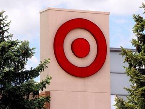 This May 3, 2017, photo shows the logo on a Target store in Upper Saint Clair, Pa. Target says it is buying delivery logistics company Grand Junction to help it offer same-day delivery service to its in-store shoppers. Grand Junction‚Äôs software connects retailers with about 700 delivery companies around the country that pick up items from distribution centers and take them to customers. (AP Photo/Gene J. Puskar)