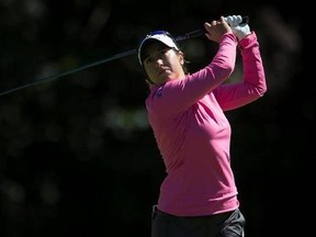 Marina Alex, from the United States, hits a drive on the fourth hole during first round play at the Canadian Pacific Women&#039;s Open in Ottawa, Thursday, August 24, 2017. Alex led THE CANADIAN PRESS/Adrian Wyld