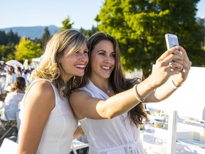Thousands of diners, all dressed in white, descended upon Devonian Harbour Park for Diner en Blanc in Vancouver on August 24 2017.