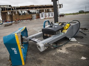 A gas pump sits demolished by Hurricane Harvey in Port Aransas, Texas, on Sunday, Aug. 27, 2017. Officials continue to keep the city on lockdown, preventing residents from entering the city  (Nick Wagner/Austin American-Statesman via AP) ORG XMIT: TXAUS104