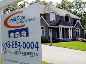 FILE - This Monday, July 10, 2017, file photo shows a house for sale, in North Andover, Mass. On Tuesday, Aug. 29, 2017, the Standard & Poor&#039;s/Case-Shiller 20-city home price index for June is released. (AP Photo/Elise Amendola, File)