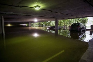 The parking garage at Bayou on the Bend on the Bend is flooded by the Buffalo Bayou on August 27, 2017 in Houston, Texas. Harvey, which made landfall north of Corpus Christi late Friday evening, is expected to dump upwards to 40 inches of rain in Texas over the next couple of days.