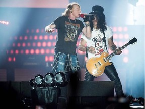 Axl Rose (L), lead singer of the US rock band Guns N' Roses, performs with Slash at Parken Stadium, Copenhagen, Denmark, June 27, 2017.